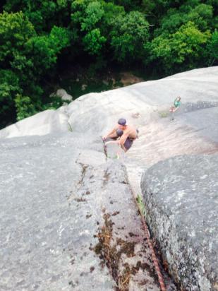 Spencer pulling the crux roof on Pendulum Route